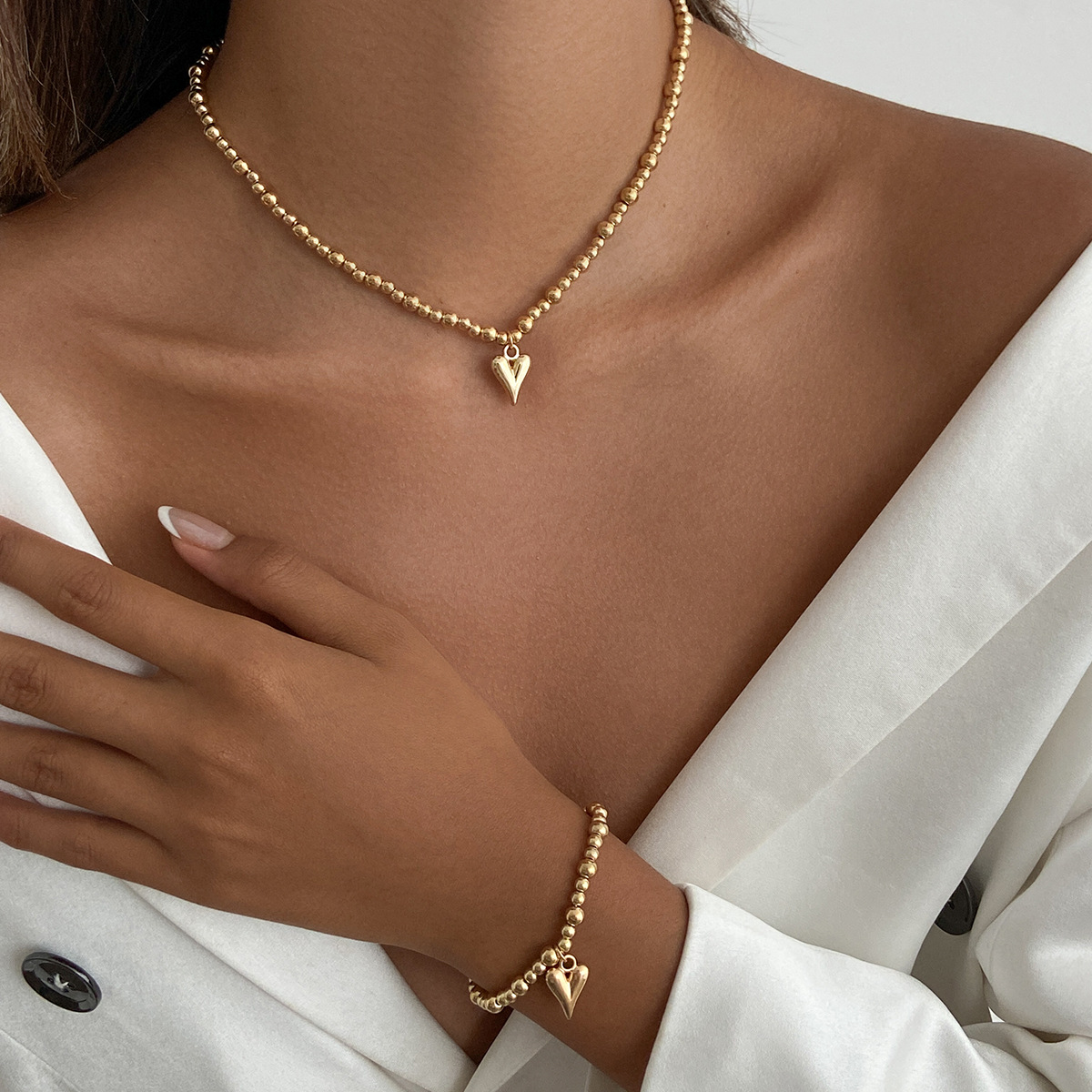 Кулон "Сердечко" цвет золото круглые камушки